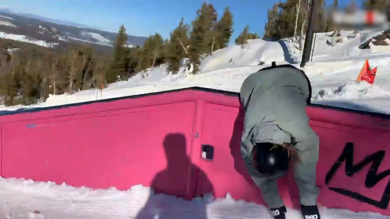 Snowboarder Falls on Her Stomach While Balancing on Rail Jukin Licensing