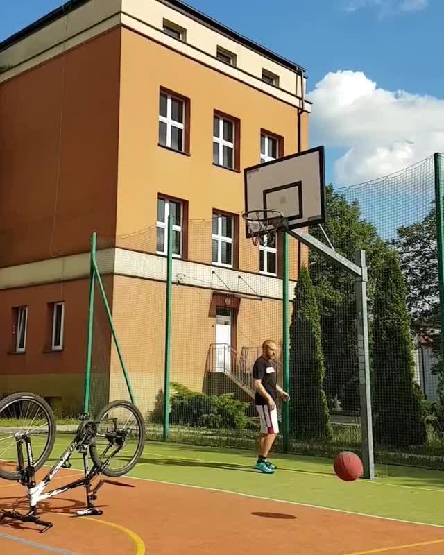 Guy Throws Basketball at Bike's Tire and It Bounces Back at His Face