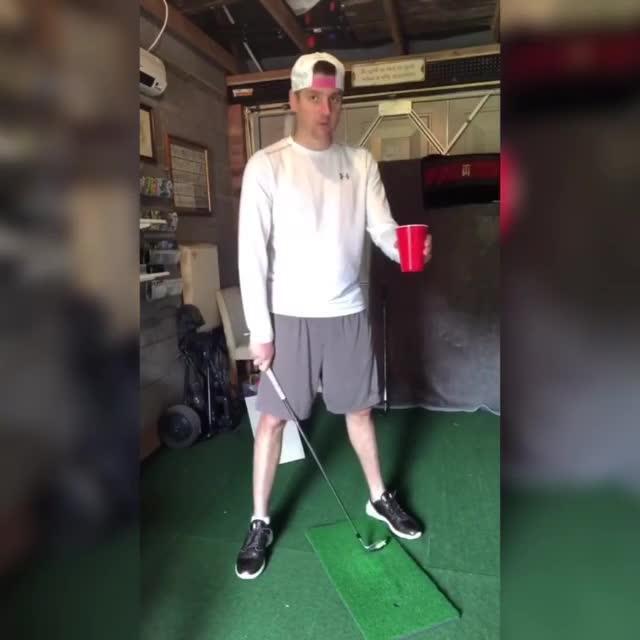 Guy Hits Golf Ball Backwards Between his Legs to Make it Fall Into cup