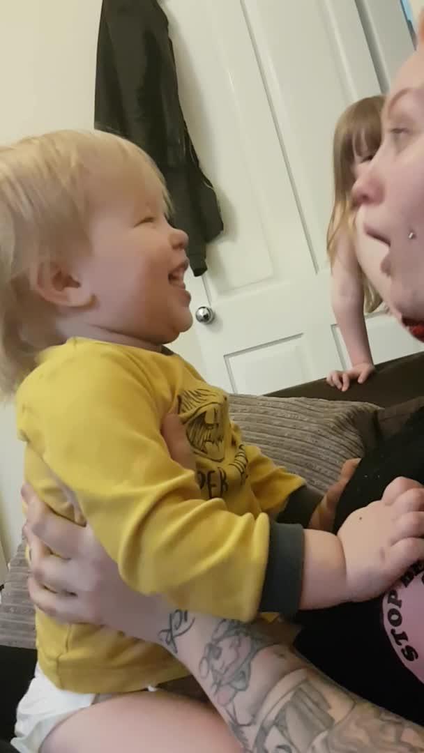 Little Girl Falls off Sofa While Mom Makes Chicken Noises Jukin Licensing