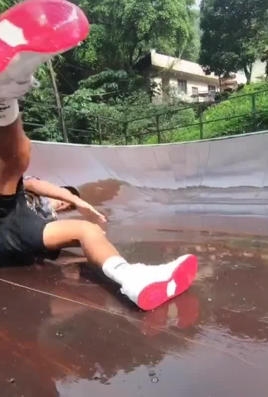 Guy Attempting Skimboard Flip Falls Various Times but Finally Succeeds