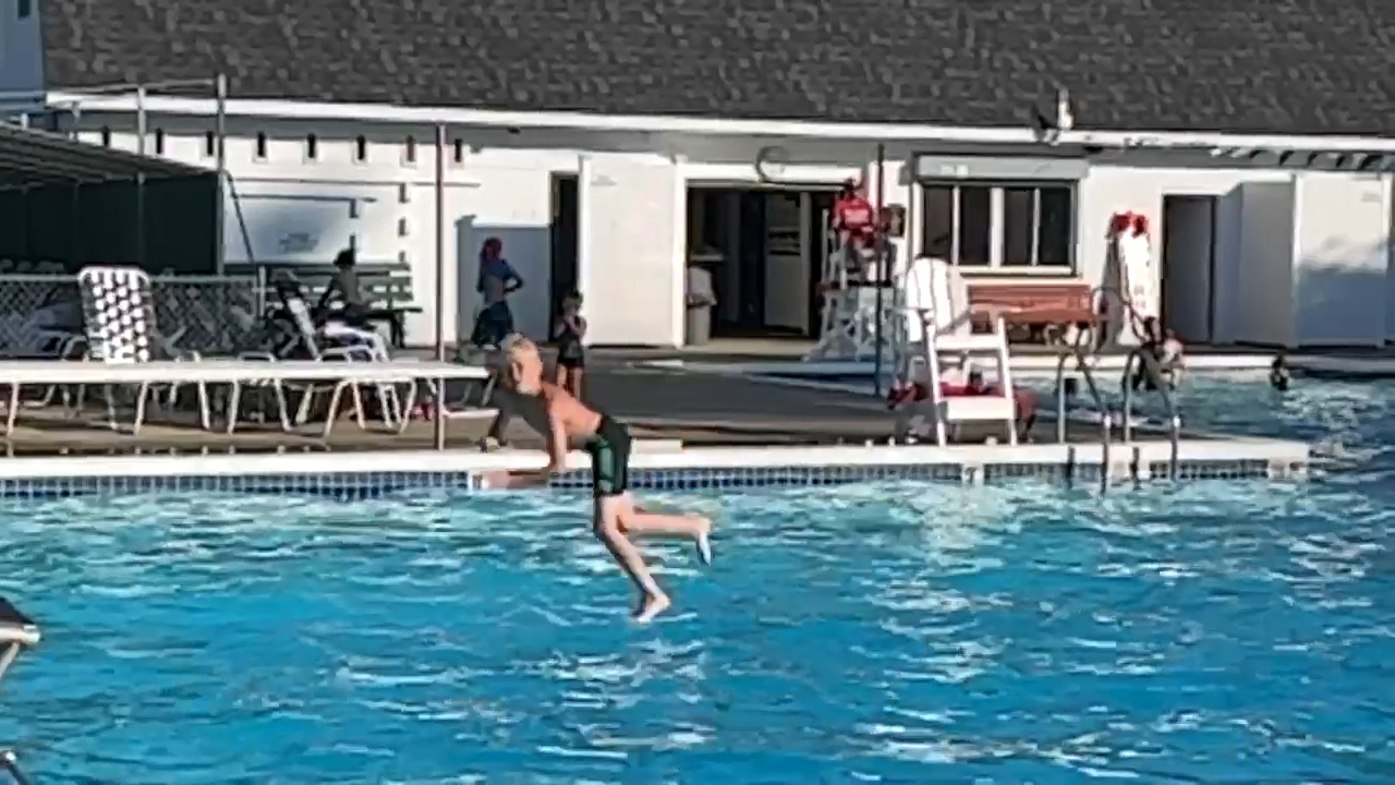 Kid Slams Head on Diving Board While Attempting Backflip in Pool