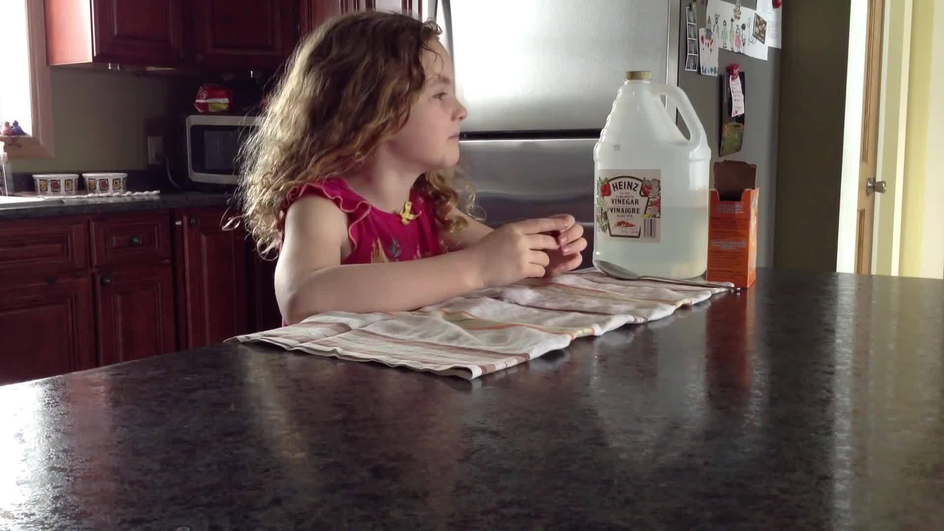 Girl Falls Pouring Vinegar for Volcano Experiment Jukin Licensing