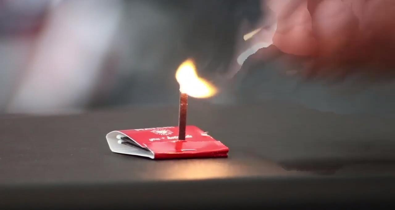 Professional Card Thrower Does Trickshots While Playing With Fire
