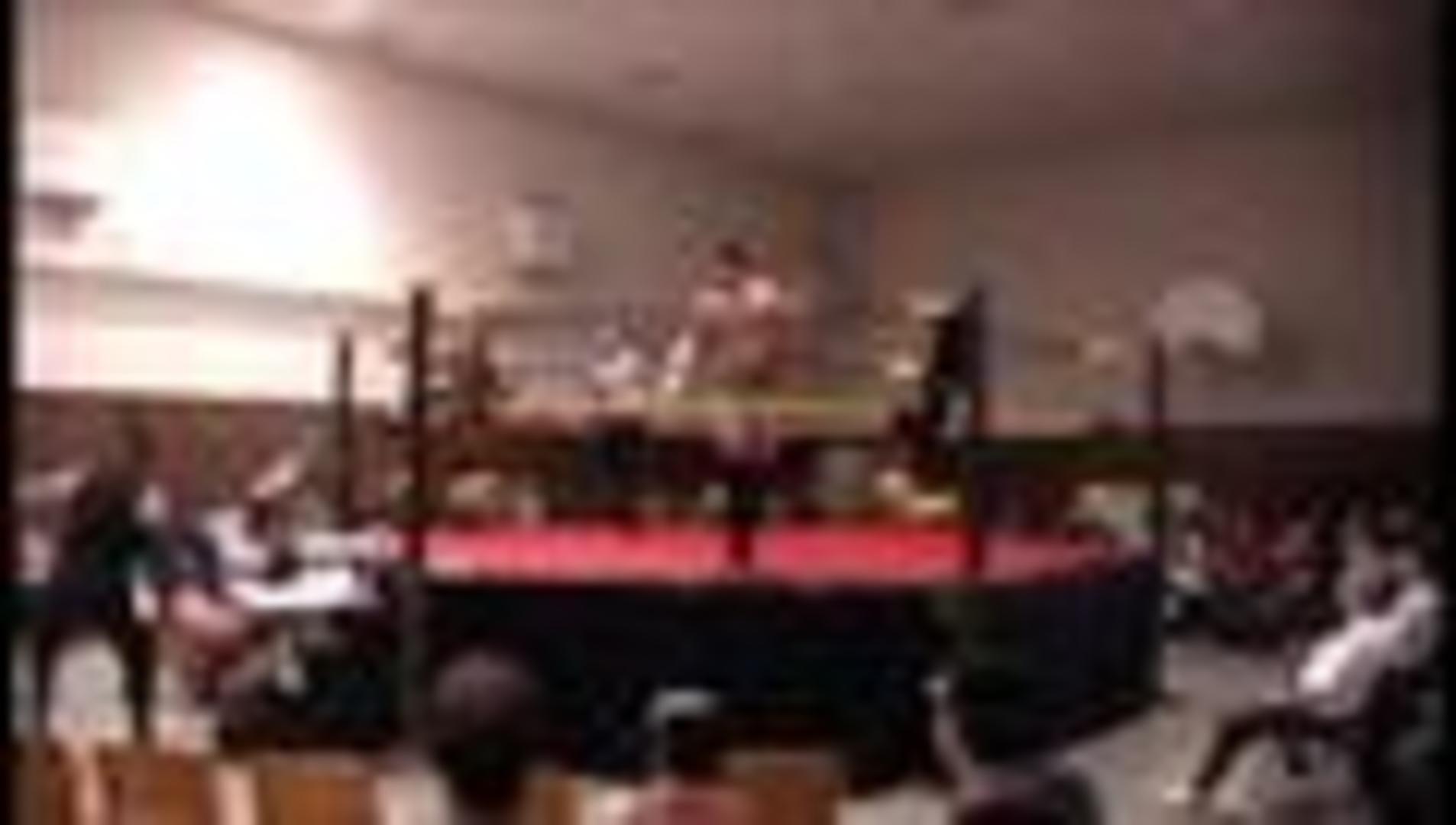 Wrestling Competitor Falls Head First from Ring Jukin Licensing