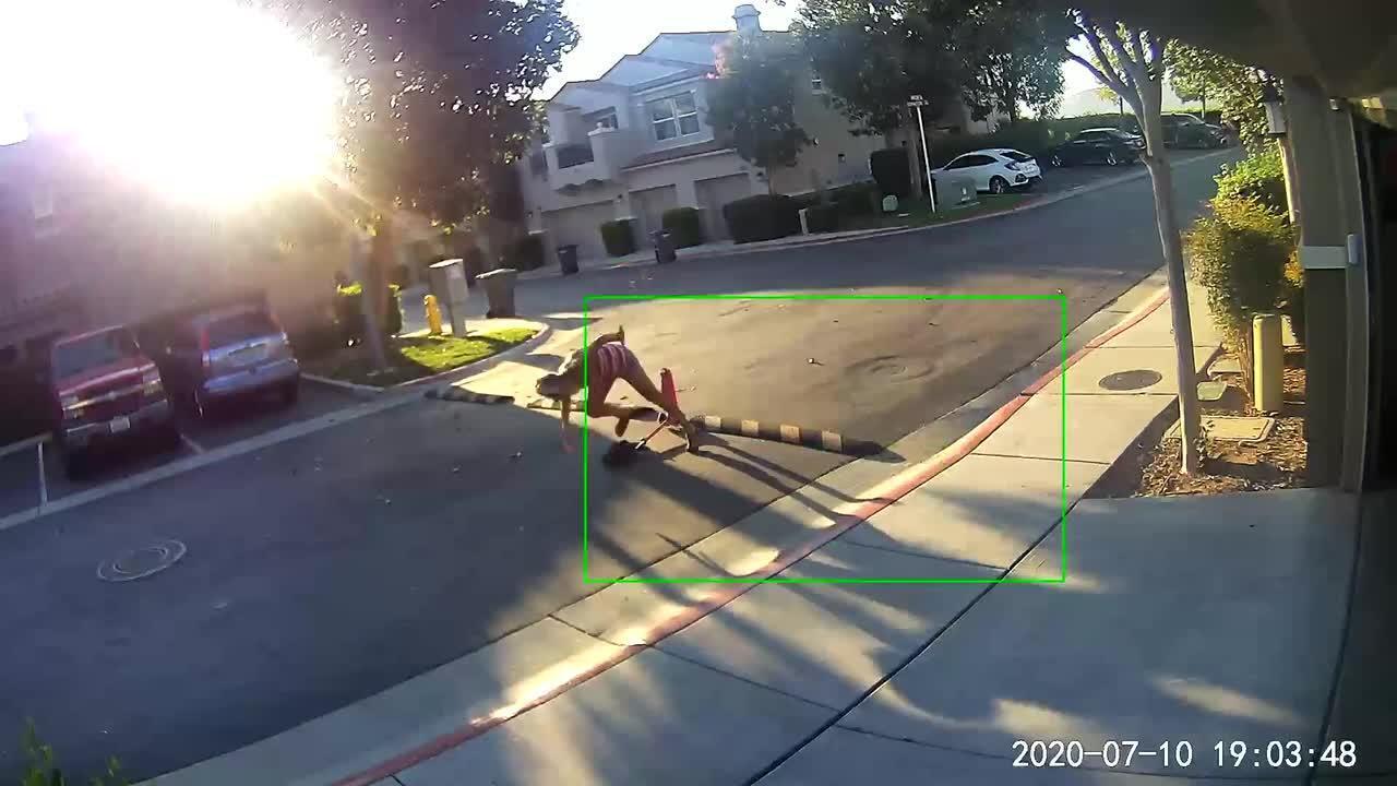 Woman Faceplants After Hitting Parking Bumper on Street While Riding a