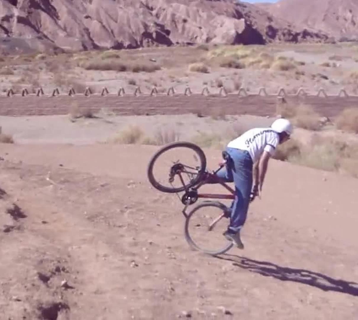 over the handlebars