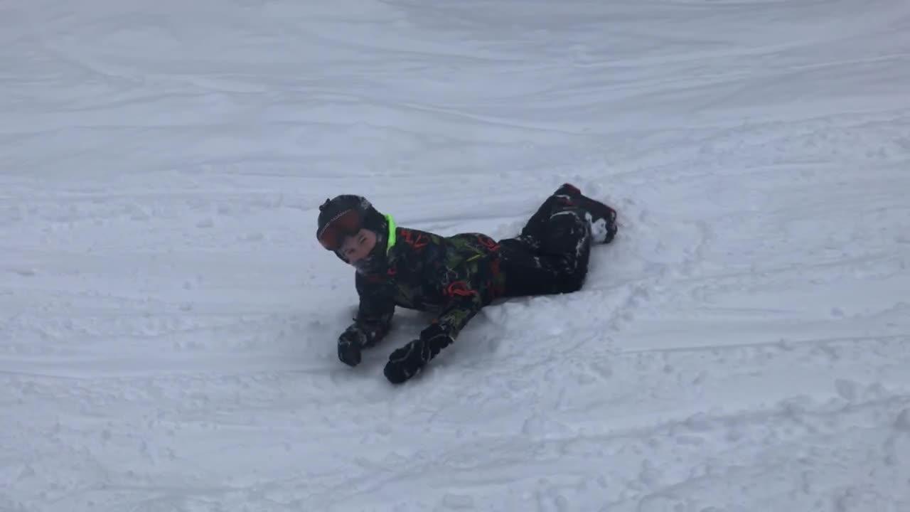 Girl Fails as she Jumps Downhill While Skiing Jukin Licensing