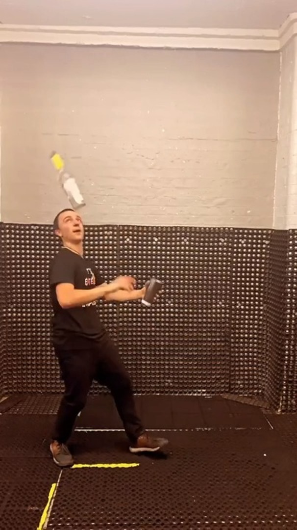 Guy Displays JawDropping Bartending Skills by Performing Tricks With