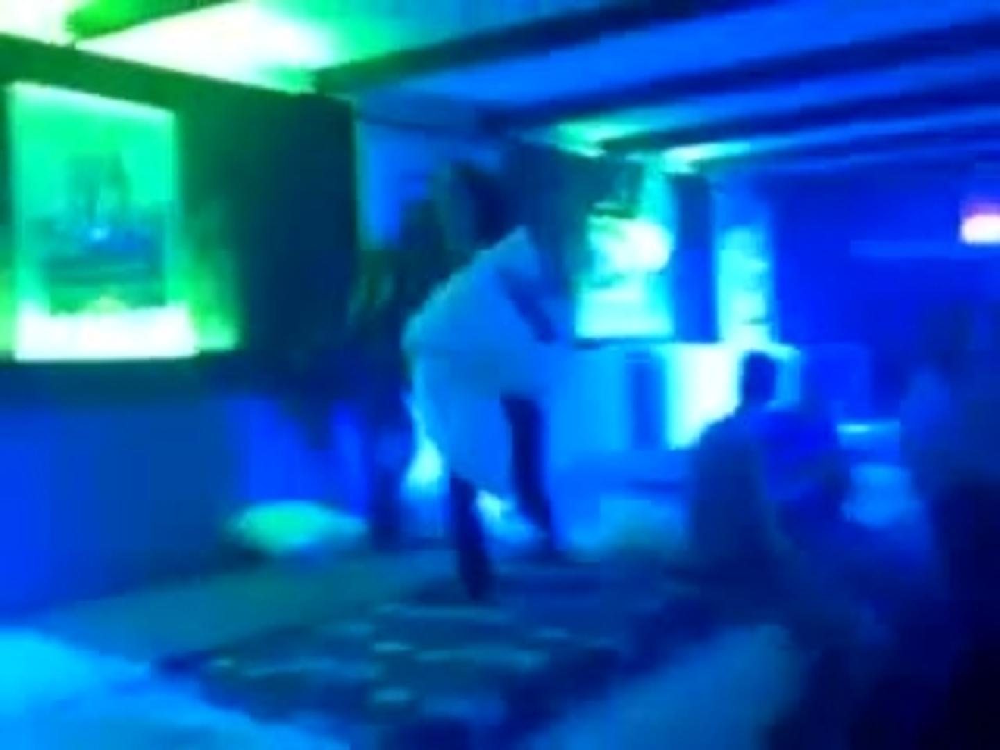 Girl in Club Throws Pillows and Falls Jukin Licensing