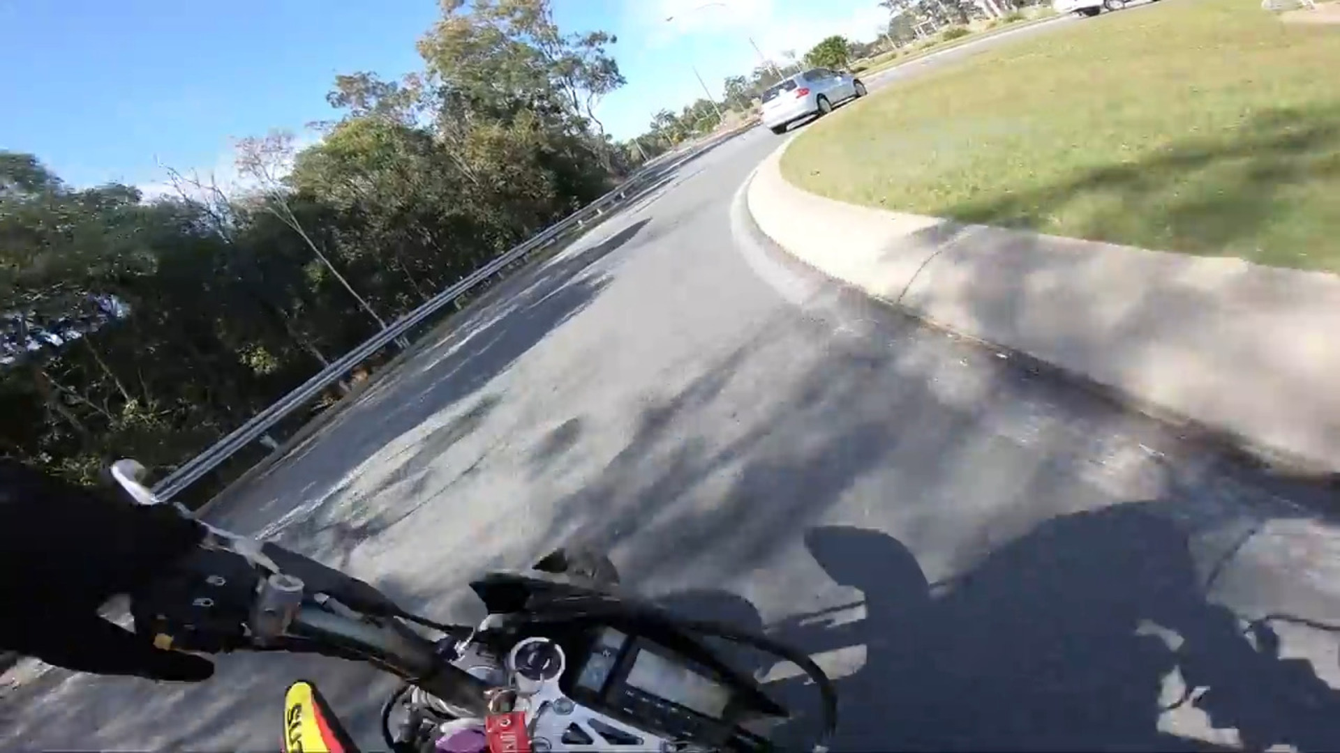 street-bike-loses-traction-around-corner-jukin-licensing