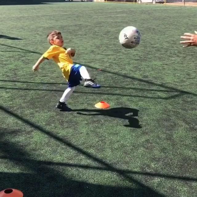 Kid Practices Chest Traps With Soccer Ball Jukin Licensing