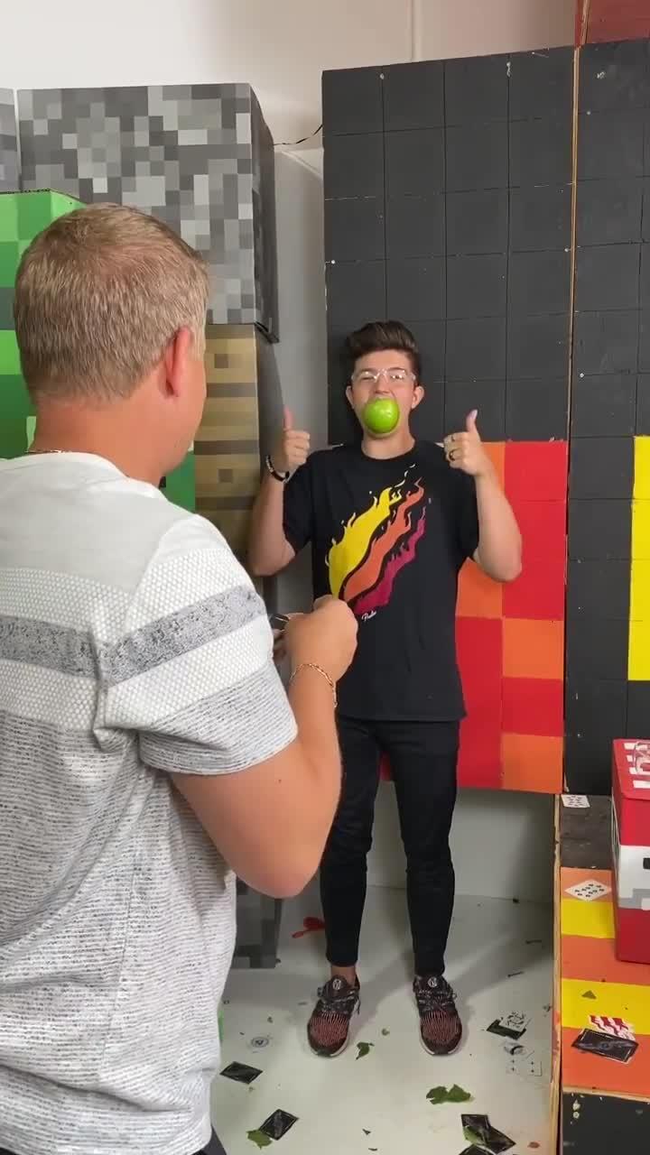 Professional Card Thrower Does Risky Trickshot With Famous Gamer