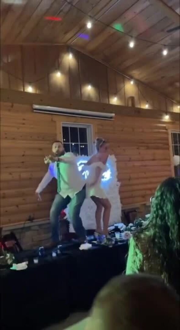 Groomsman Hilariously Falls Off Table While Dancing With Bride Jukin