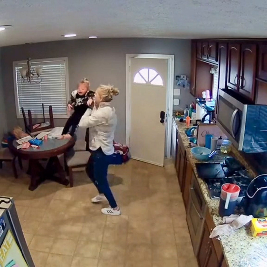 Toddler Falls Off Chair While Mother Works in Kitchen Jukin Licensing