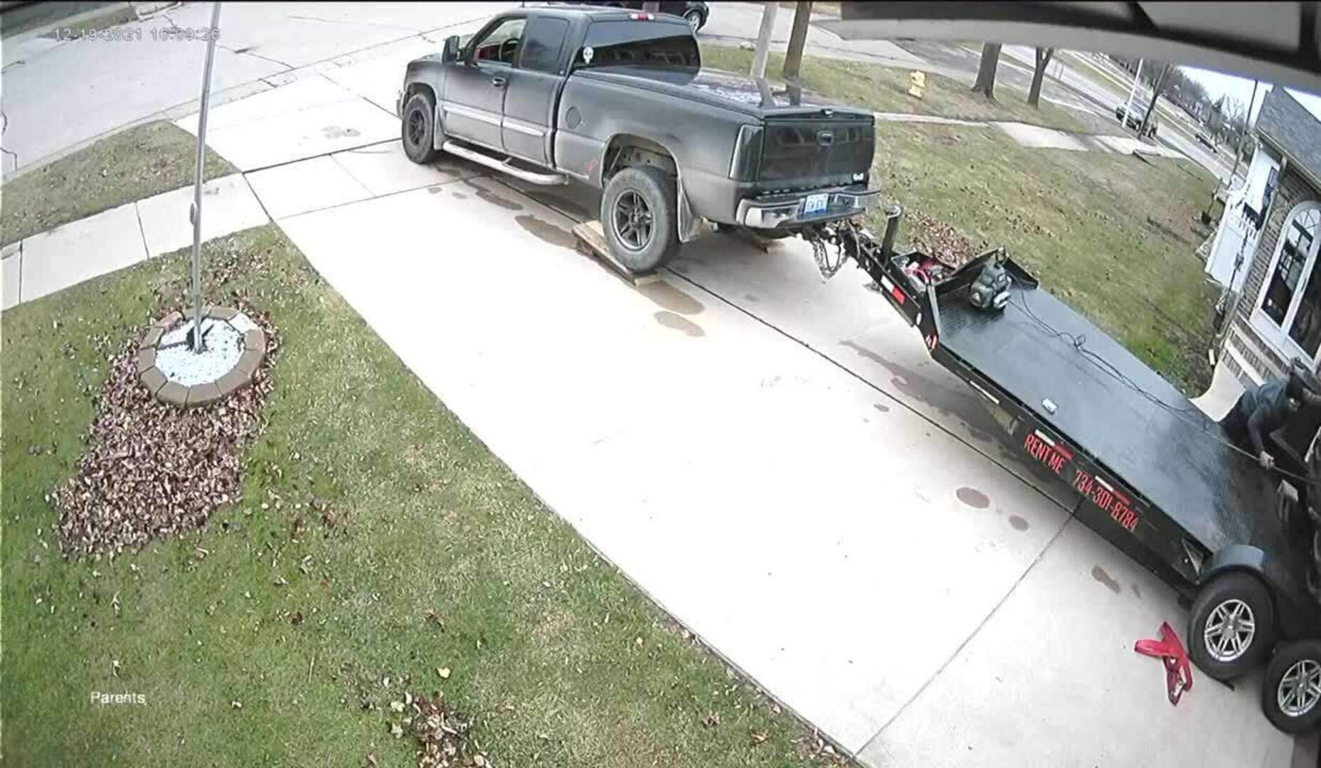 Truck Slides Forward on Driveway While Unloading Tractor Attached to it Jukin Licensing