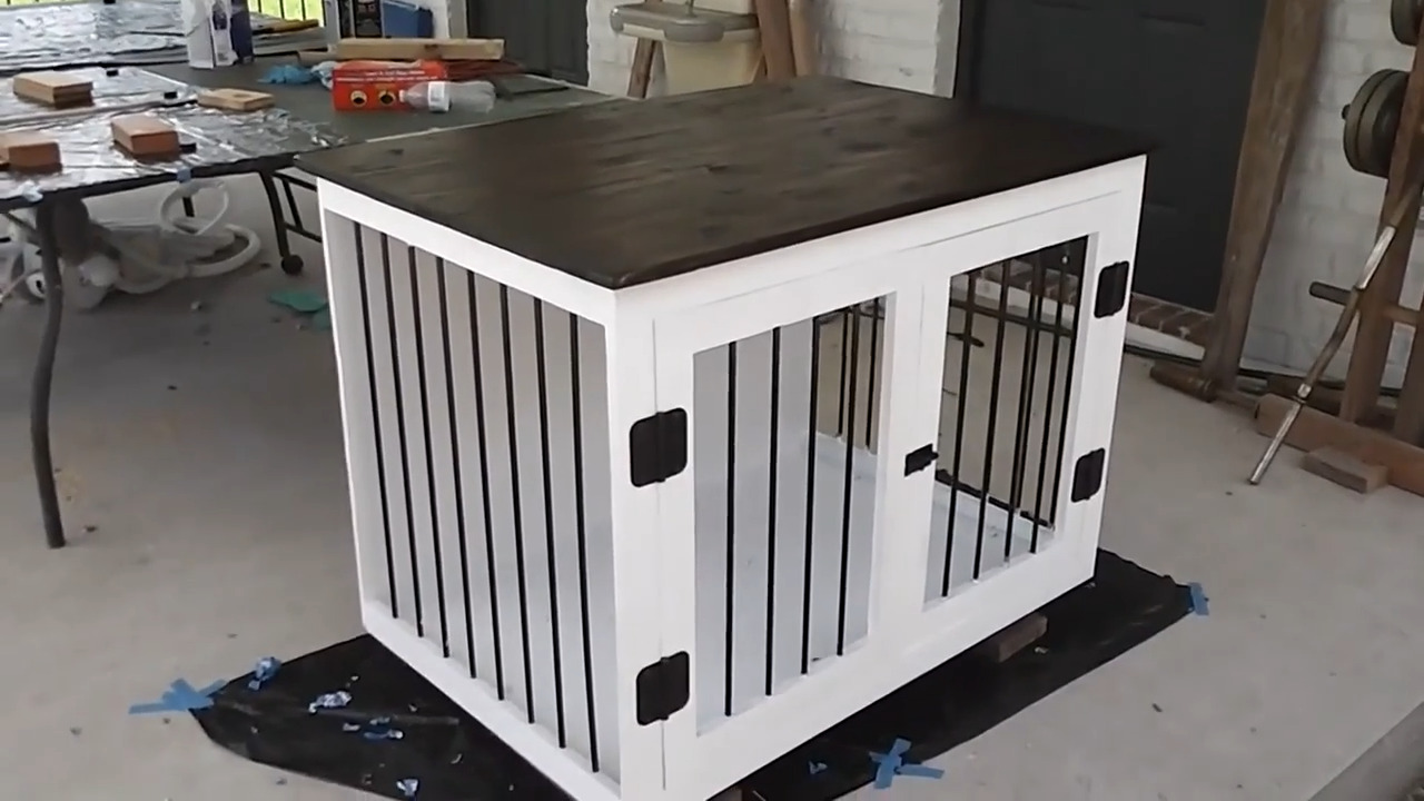 person-makes-diy-dog-kennel-using-iron-rods-and-wood-jukin-licensing