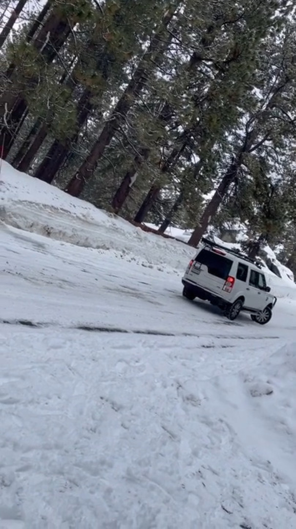 Car Slides Down Backwards on Snow and Crashes Into Another Car Jukin