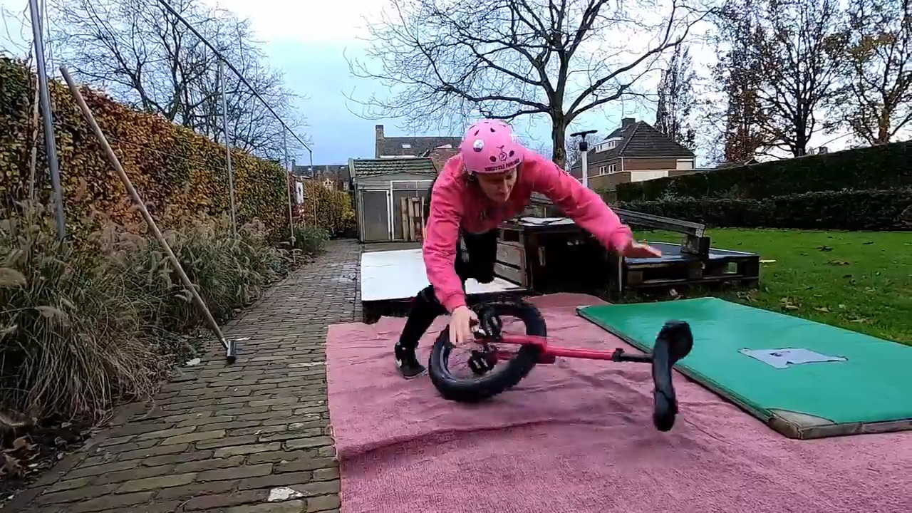 Woman Attempting Jump Trick on Unicycle Falls Down Jukin Licensing