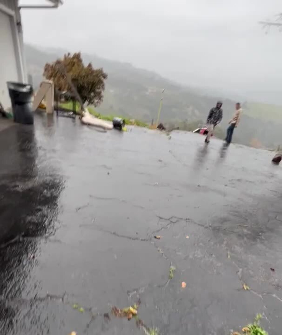 Car Slides Down Slope While it Rained in Valley Center, California