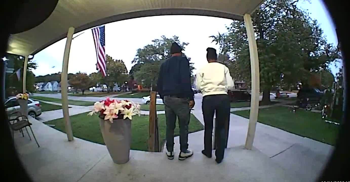 Home Security Camera Captures Car Crashing into Truck Outside House